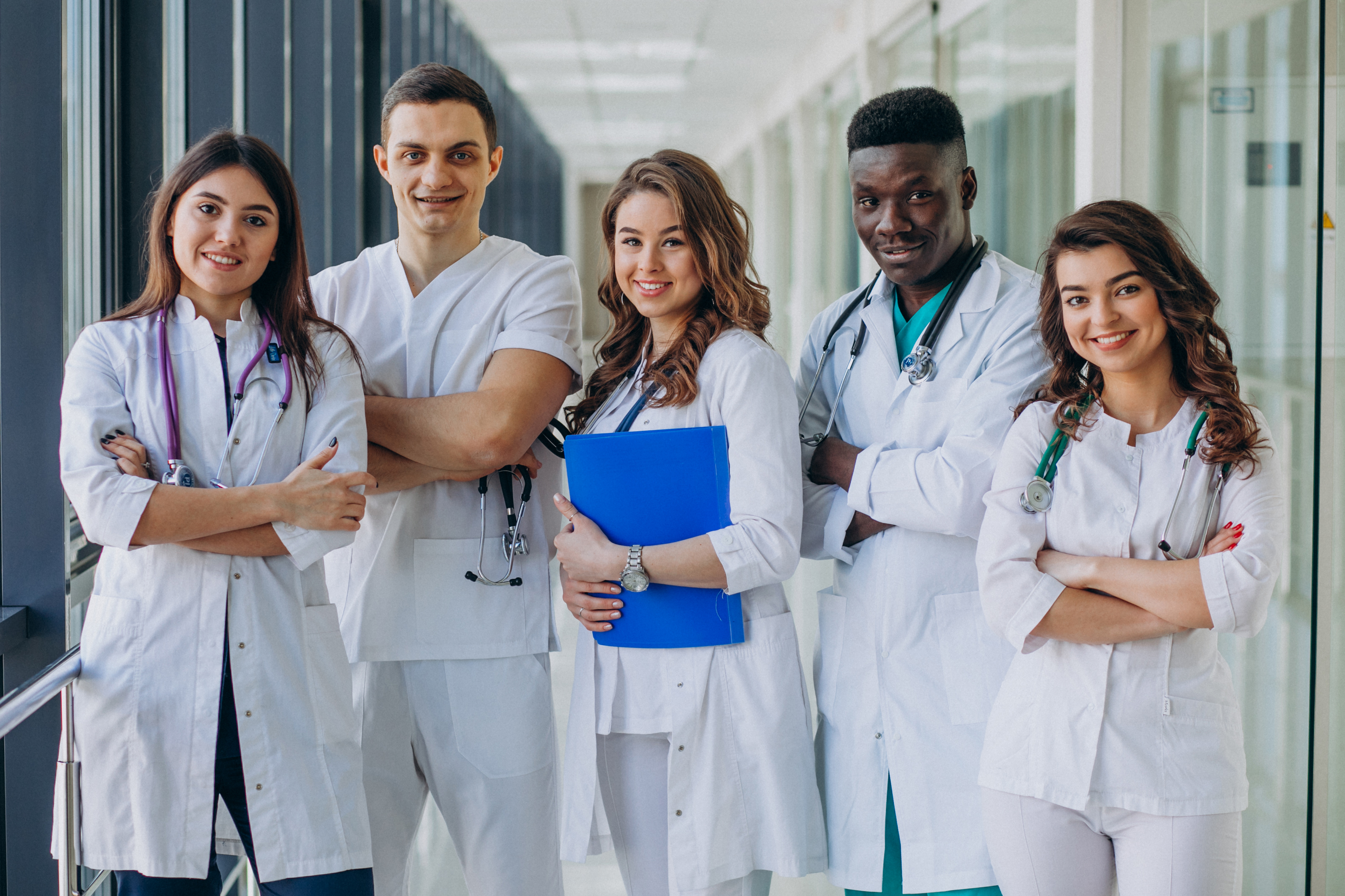 Diverse team of medical professionals collaborating on education strategy